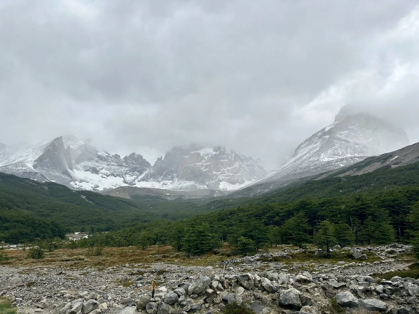 Snow-capped granite peaks around the French Valley under low cloud near Mirador Británico