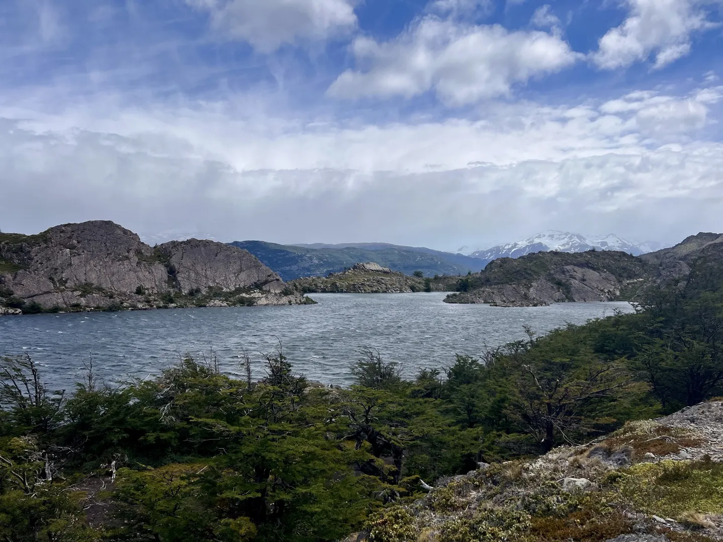Rocky islands in Laguna Los Patos, beside the trail from Paine Grande towards Grey Glacier