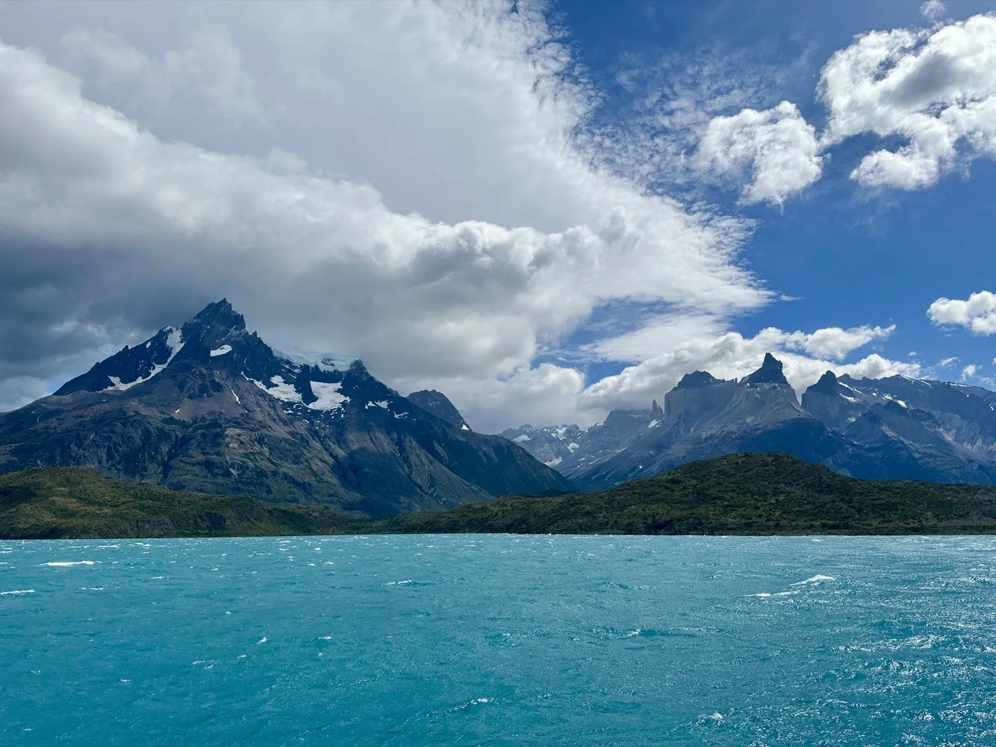 Peaks of the Paine massif across the turquoise water of Lago Pehoé, seen from the catamaran