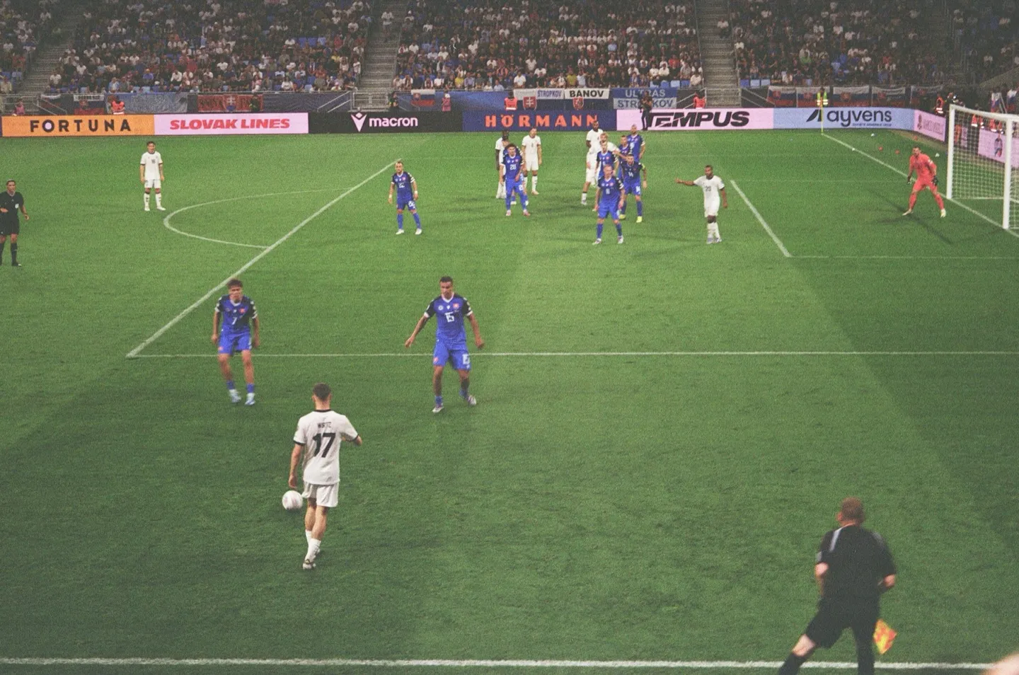 Football match under floodlights