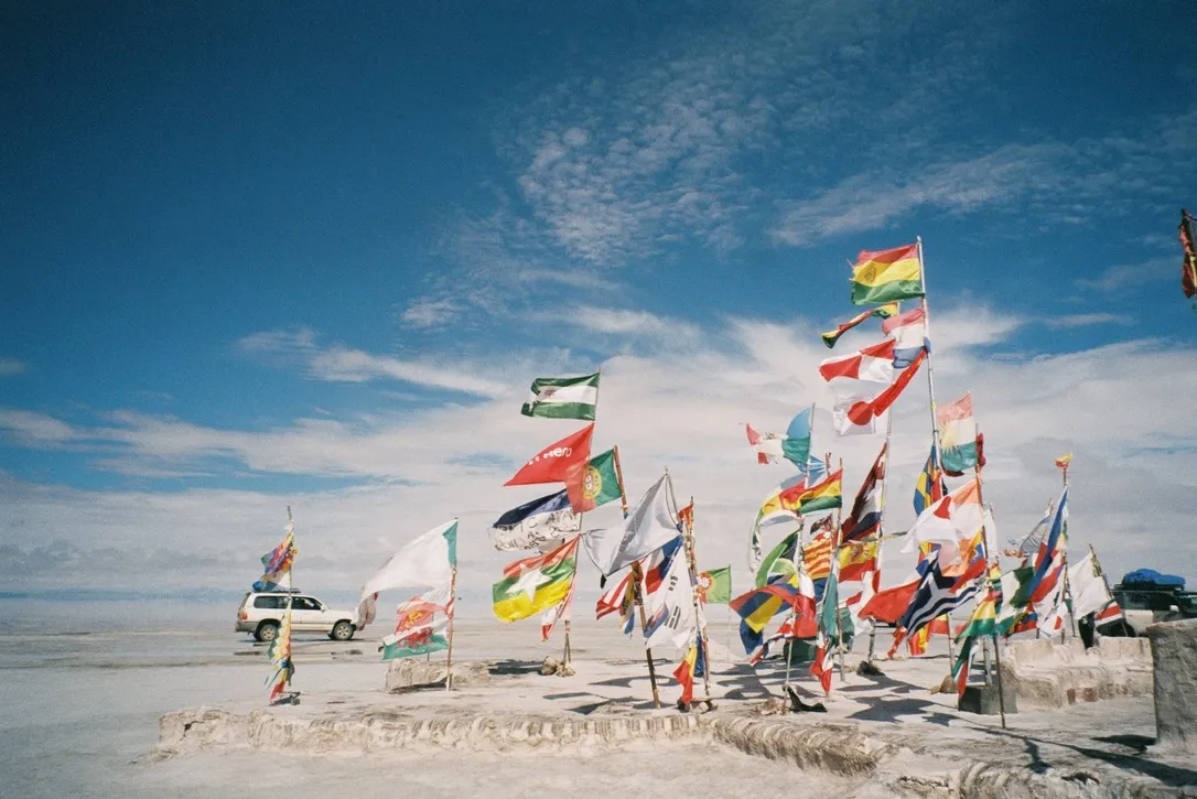 Flags of the world on the Salar de Uyuni salt flat, Bolivia