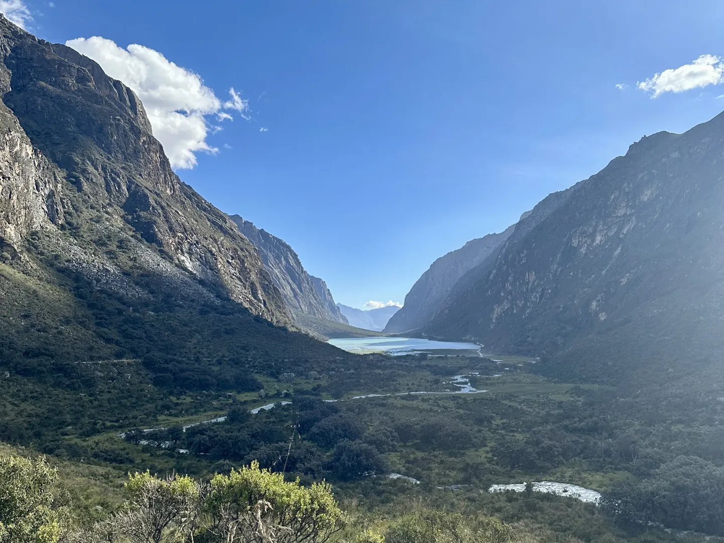 Looking back down the valley on the descent from Laguna 69, the river winding towards a lake in the distance