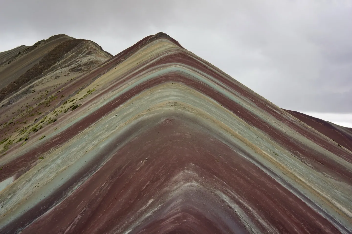 Close-up of Rainbow Mountain's red, turquoise and gold striped ridge, Vinicunca, Peru