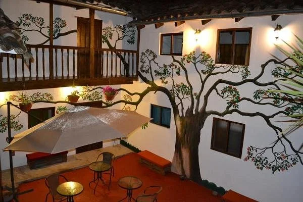 Painted courtyard at Tucan Hostel, Cusco